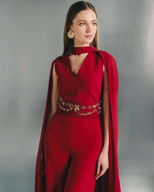 Rouge Jumpsuit with Embellished Waist Cape.